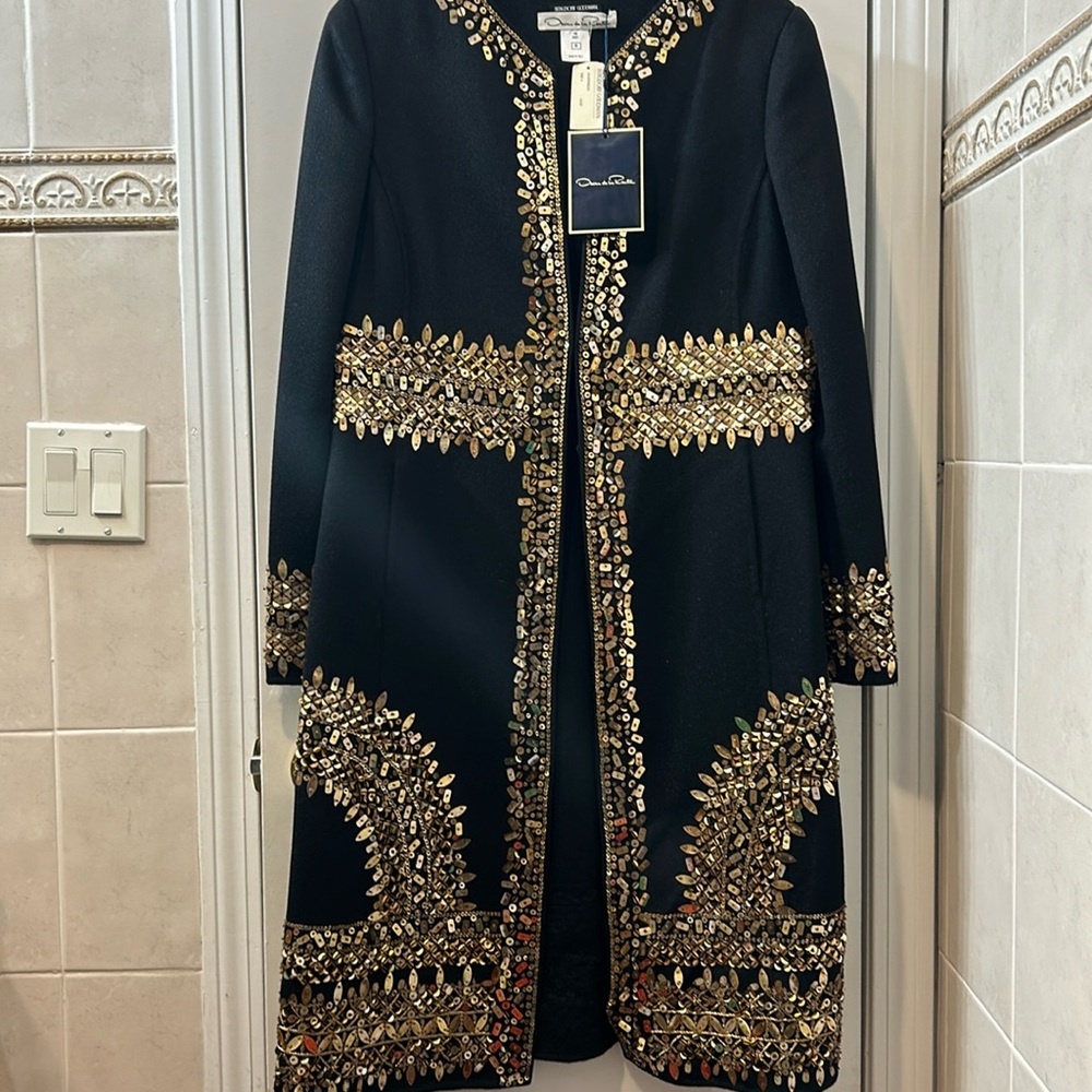 It’s Oscar de la Renta Size:it is very gorgeous.us 10; Brand New, never wear.